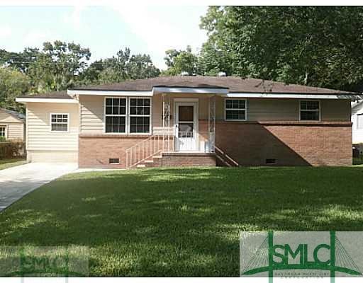 Exterior Front. Well kept and not a weed in the pr