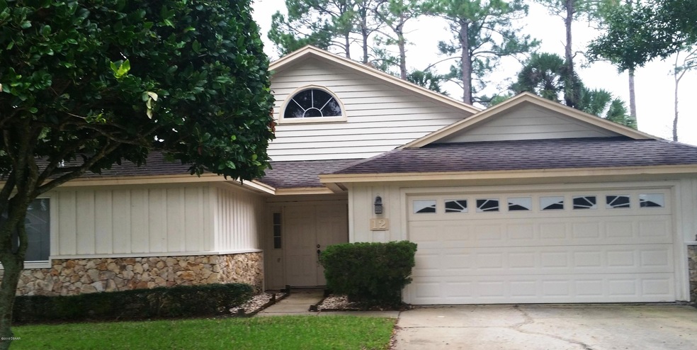 12 Treetop Front Photo1