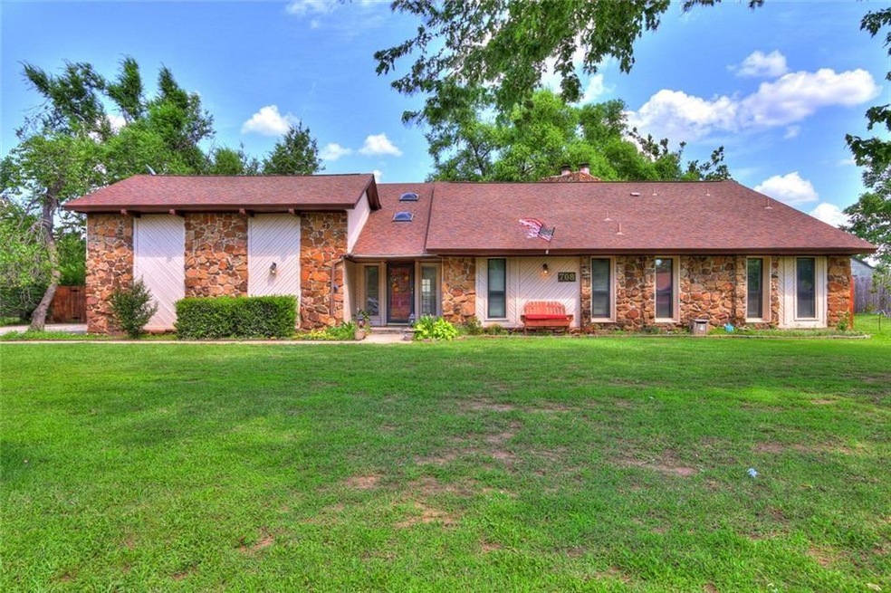 Inviting front view of this 4 bedroom home sits on