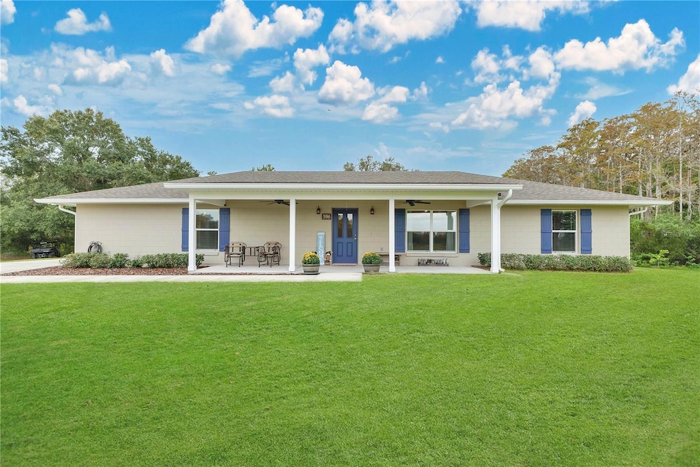 396 N Post Office Rd, Kenansville, FL 34739 - photo 1