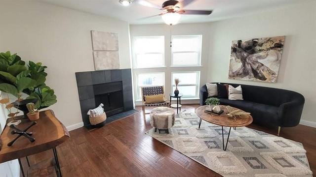 Enter into this classy family room with high ceili