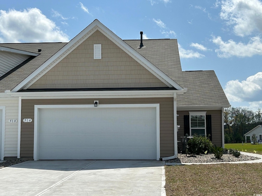 View of front of house featuring roof with shingle