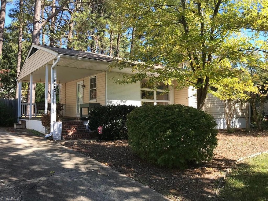 Look out on the beautifully landscaped front yard.