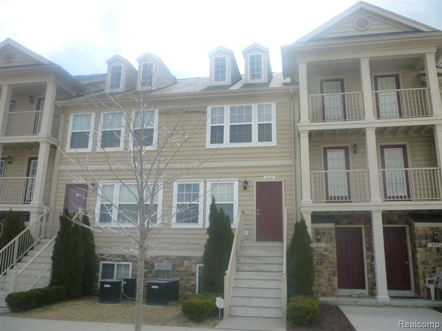669 Lewa Downs Dr unit 101, Pontiac, MI 48341 - photo 1