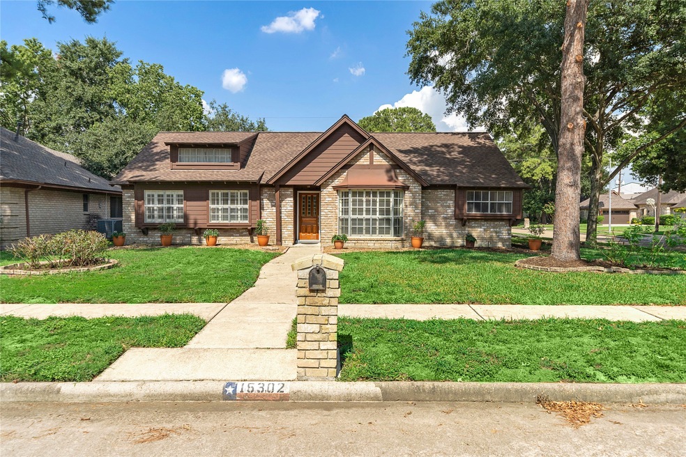 15302 Windy Cove Dr, Houston, TX 77095 - photo 1