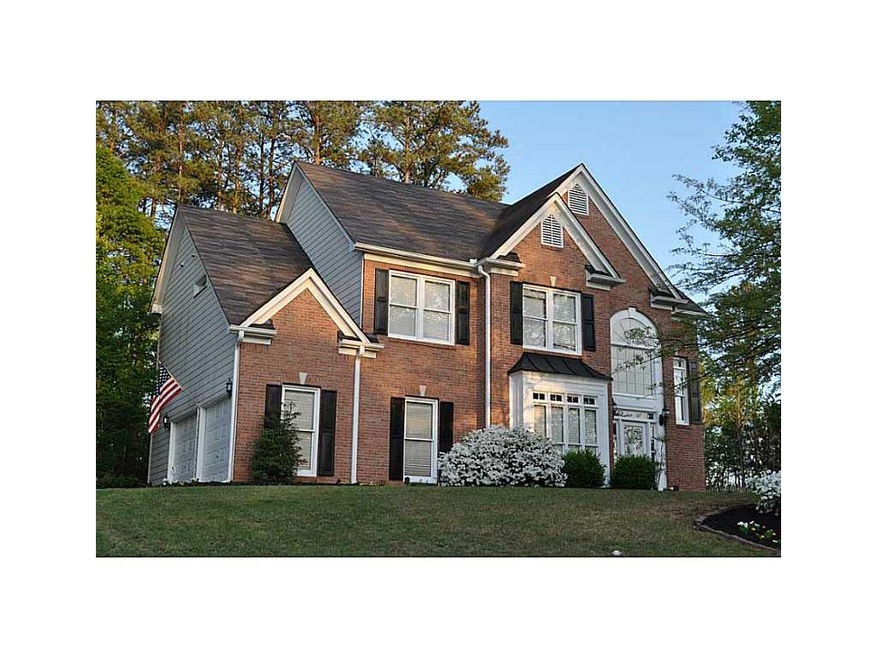 Exterior Front. Incredible curb appeal with large 