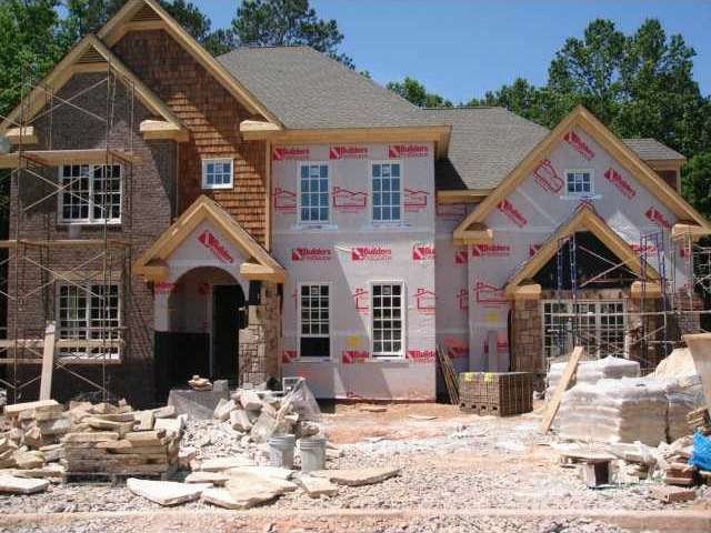 Exterior Front. New construction Brick / stacked s