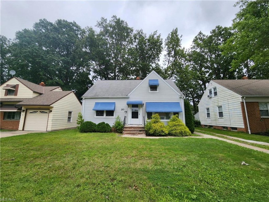 View of front of property with a front yard