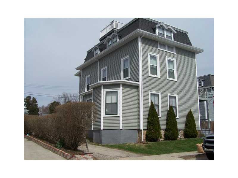 Exterior Front. Off-street parking and rear yard t