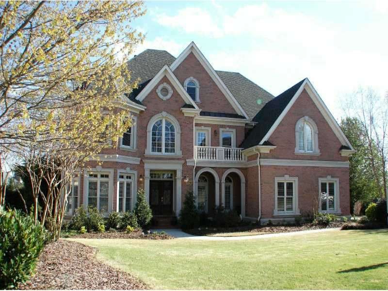 Exterior Front. Stately brick home offers sophisti