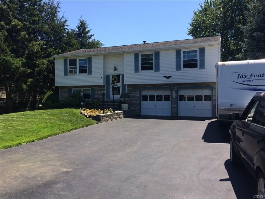 Huge 3 car wide driveway!