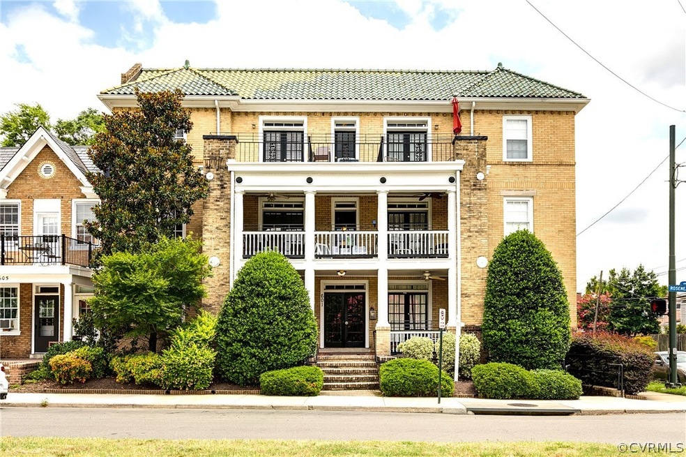 View of front of house with a balcony