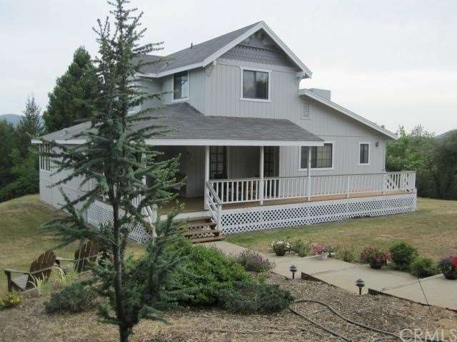 The entry is off the covered decking at the back o