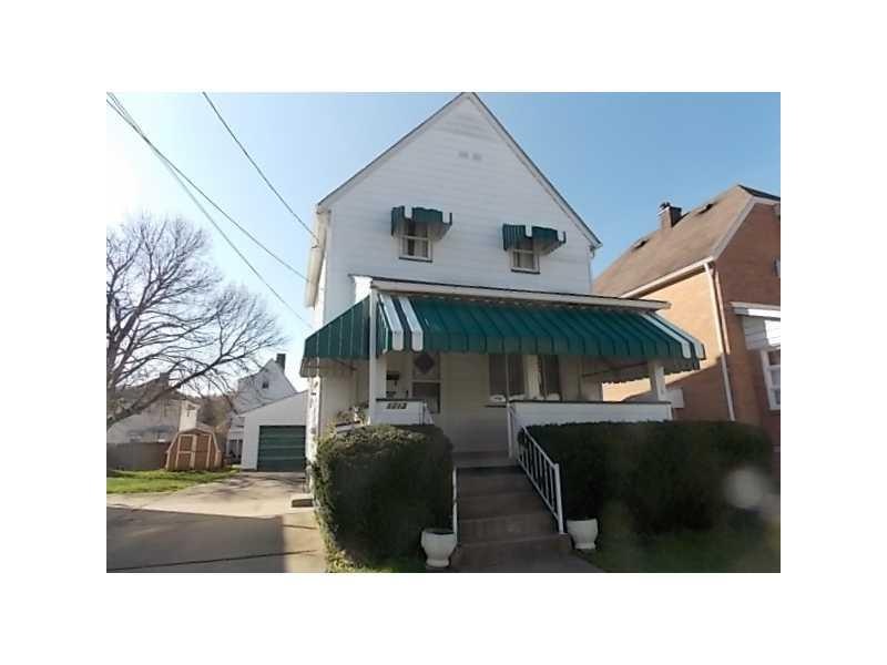 Exterior Front. Great front porch. Tons of parking