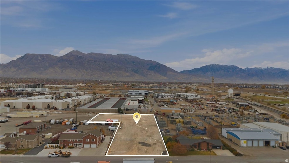 View of mountain background featuring an industrial area