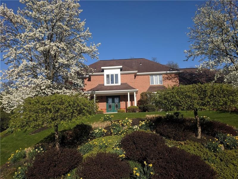 Professionally landscaped and maintained front yar