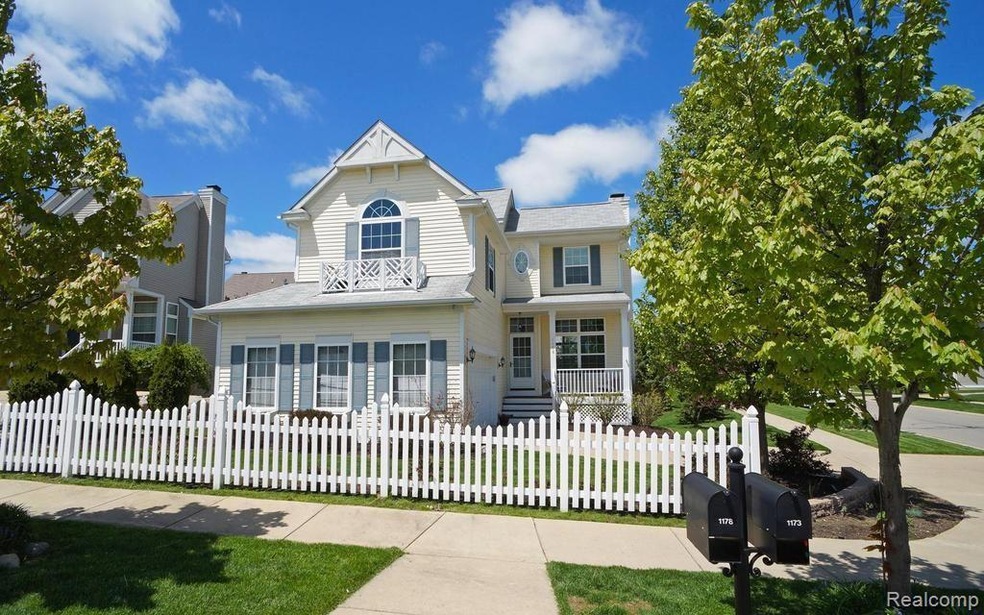 Adorable 2 story home with cute white picket fence