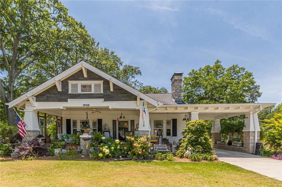 Craftsman inspired home featuring concrete drivewa