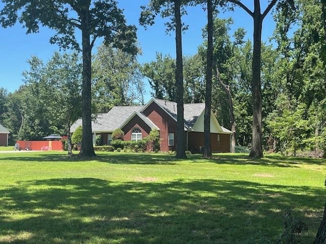 View of front of home featuring a front lawn