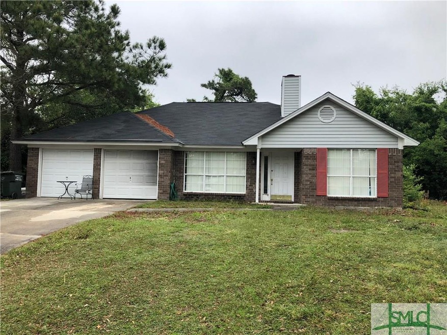 FRONT ELEVATION, HOME IS HIGH ABOVE THE STREET.