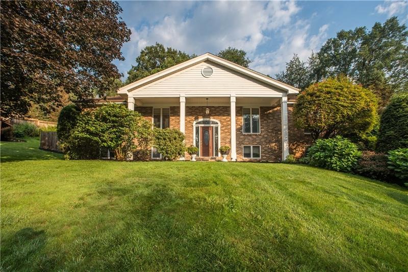 Curb appeal starts with the covered front porch & 