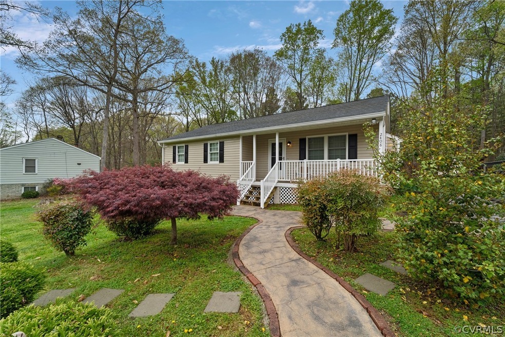 Single story home featuring a porch