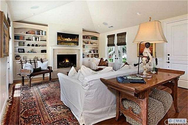 The great room boasts numerous French doors to fro