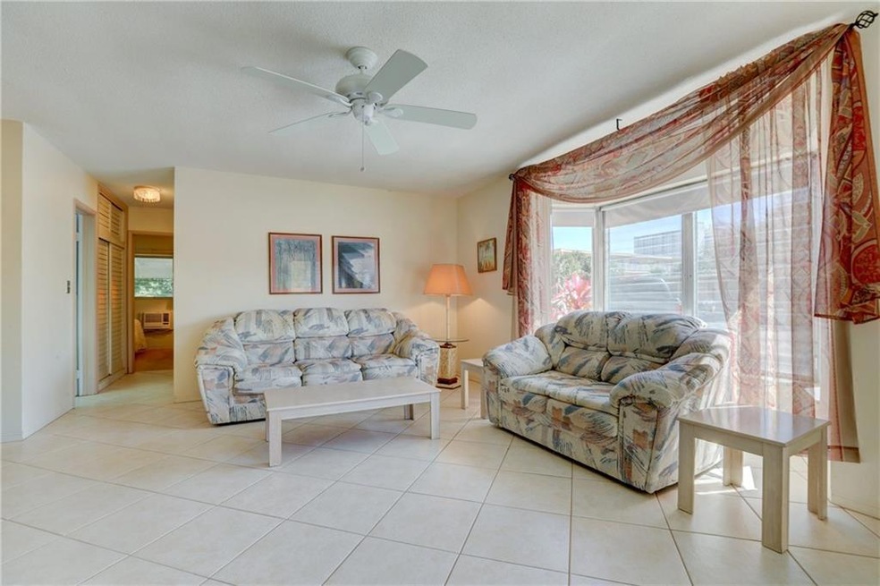 1st Floor Corner Co-op Unit, Ground Level Entry, Furnished Condo, 2 Bedrooms, 1 Bathroom, Open Porch, Pool, Exterior Storage Unit and 1 Deeded Parking Space Right Outside Your Door. Welcome Home!