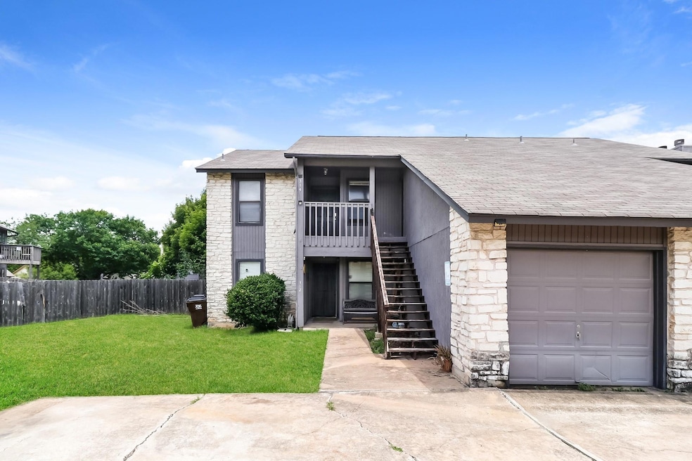 Multi unit property with stairs, stone siding, ro