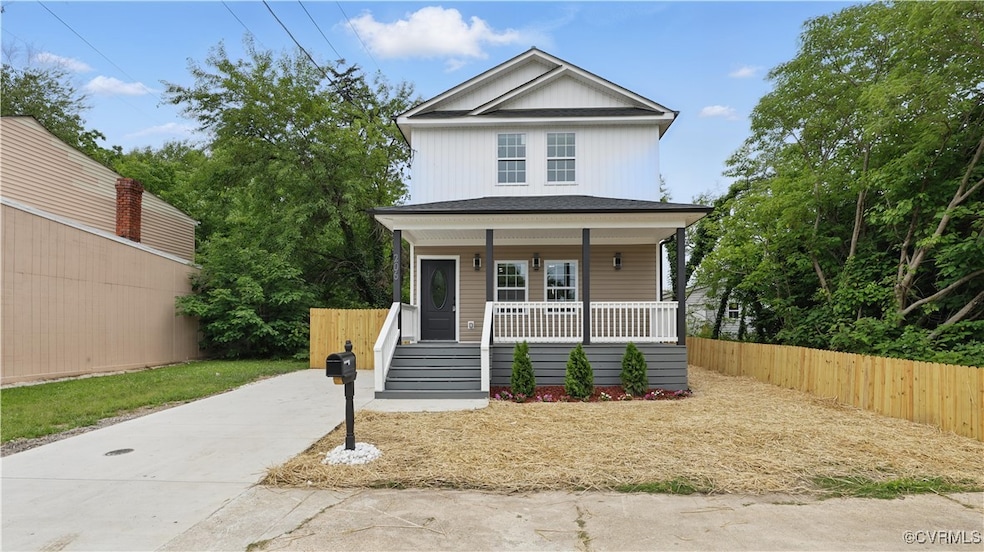 View of front of property featuring a porch and dr