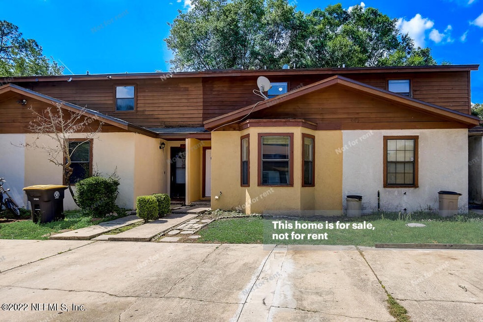 7676 Melissa Ct N, Jacksonville, FL 32210 - photo 1