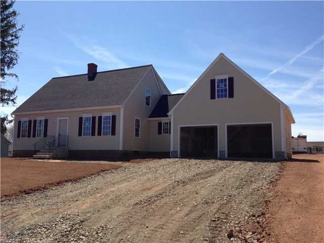 Exterior Front. Driveway to be paved