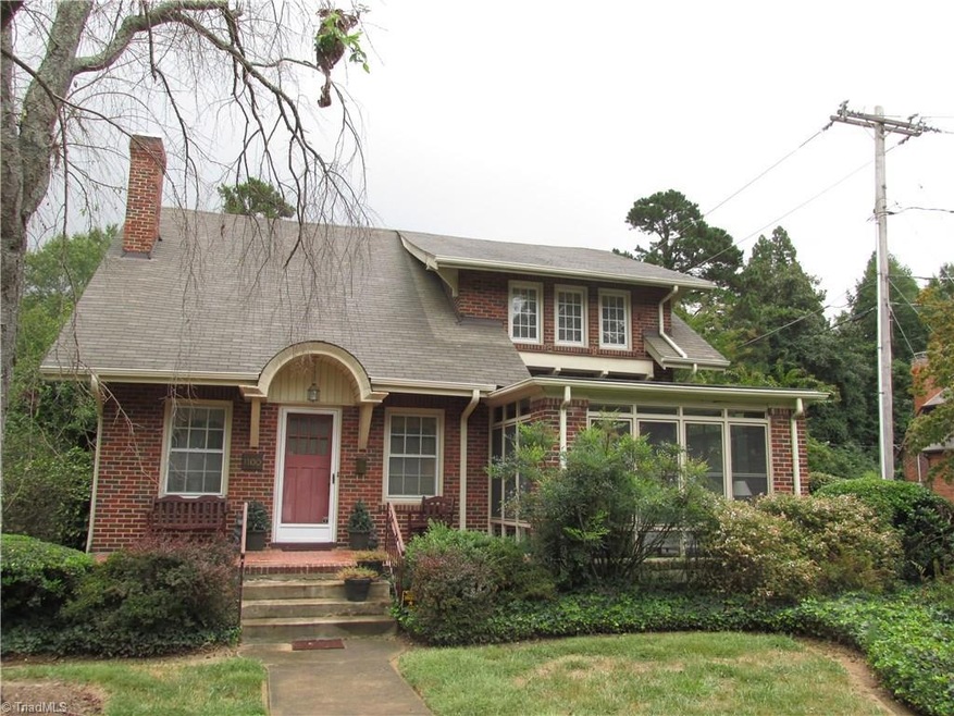 Lots of character in this vintage home - many built-ins, designed hardwood floors, and lots of privacy!