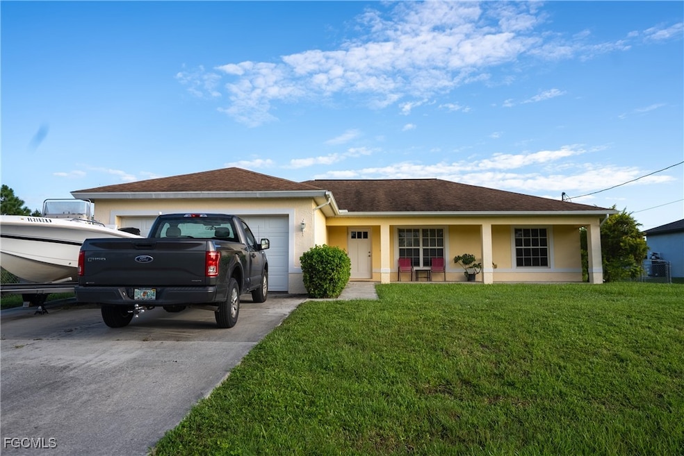2516 13th St SW unit 13, Lehigh Acres, FL 33976 - photo 1