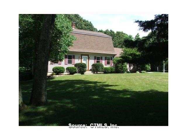 Exterior Front. Left side of front yard looking at
