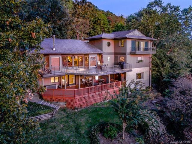 View of the rear of this beautiful home as the sun