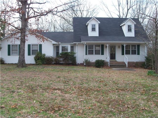 Front view of this home. Treed lot ( many dogwoods) fenced back yard, GREAT floor plan!!