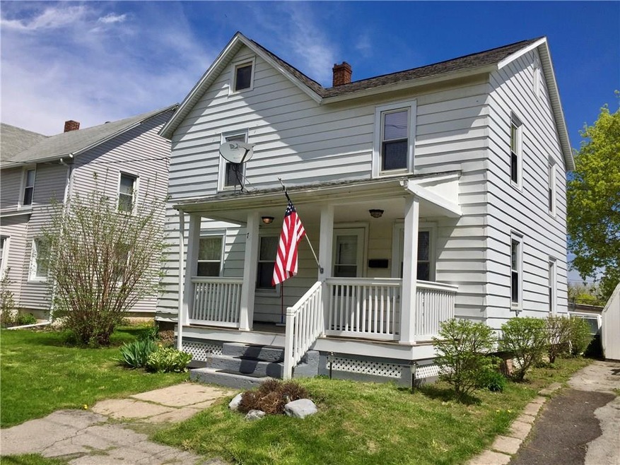 Exterior with open front porch.