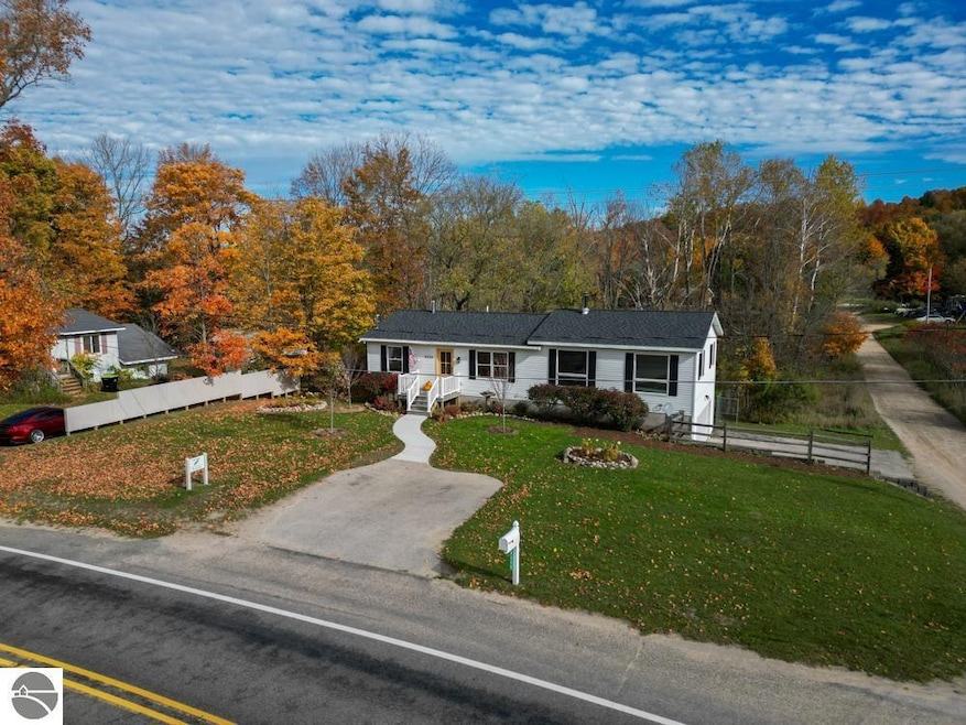 8335 S Maple City Rd, Maple City, MI 49664 - photo 1