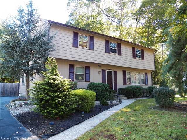 Exterior Front. Garrison Colonial Saltbox set on l