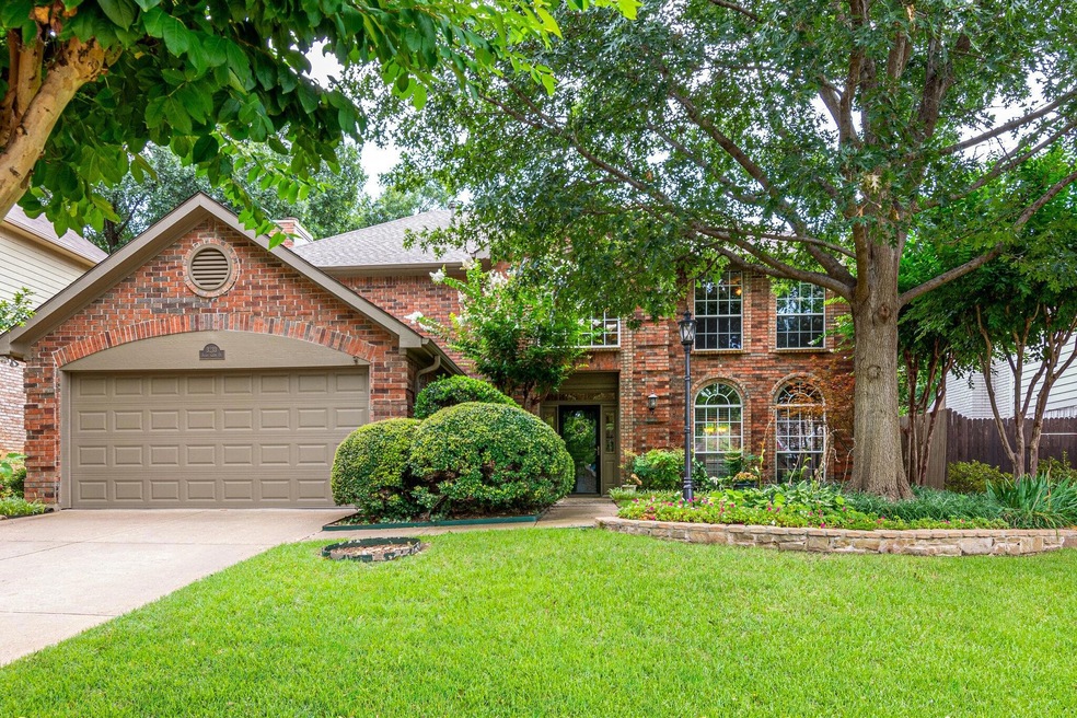 Nice drive up appeal. Mature trees and lush landsc
