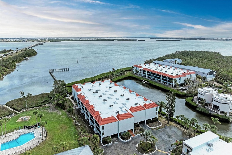 Building is on the bay.  This unit top front unit facing north (on left)