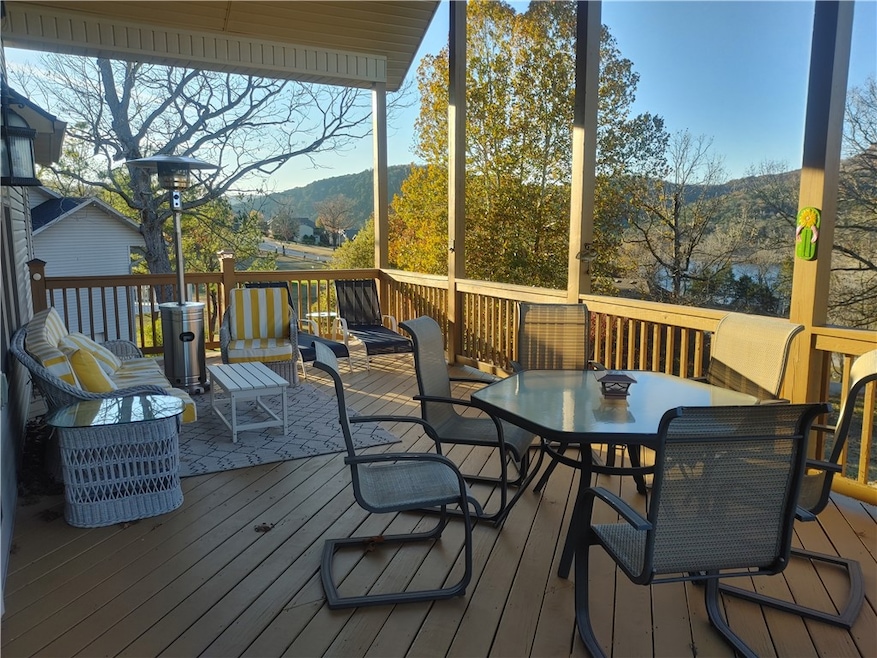 Deck spans along the back of the home for a season