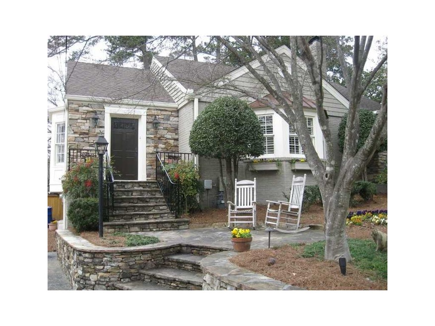 Exterior Front. Beautiful stacked stone and flagst