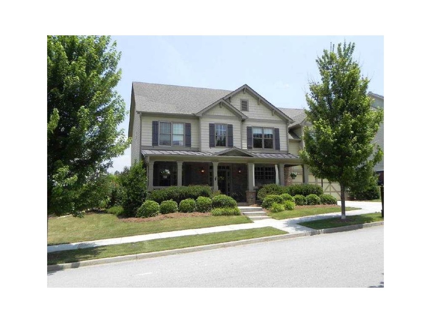 Exterior Front. Two story home with a partial bric