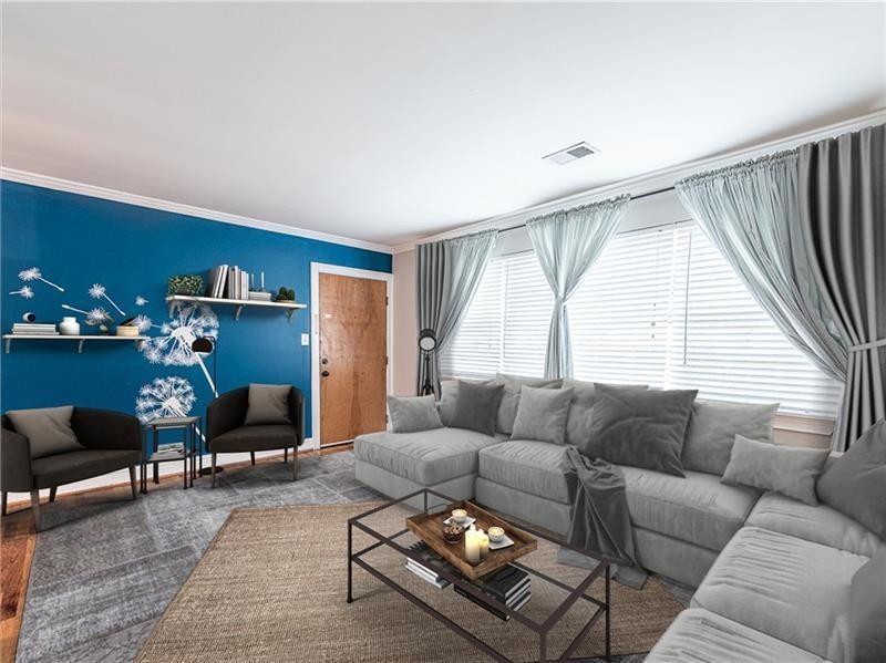 Living area shown with furniture; charming and coz
