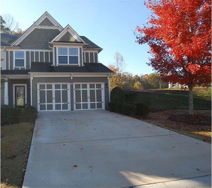 Craftsman style end unit townhome