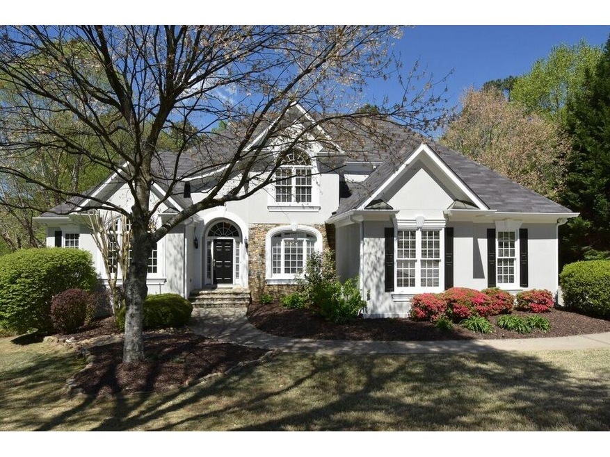 This custom-built hardcoat stucco home boasts grea
