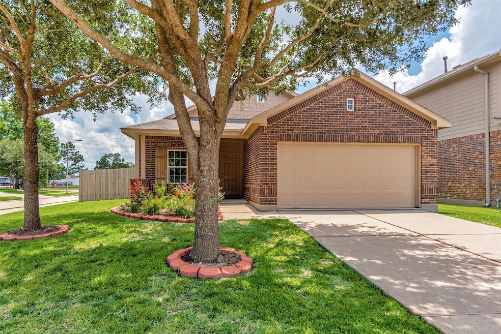 Welcome home to beautiful curb appeal, mature shad