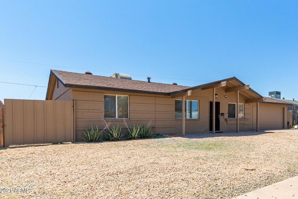 Large front yard with RV gate access